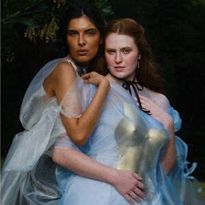 Hand made women’s breast plate corset in gold